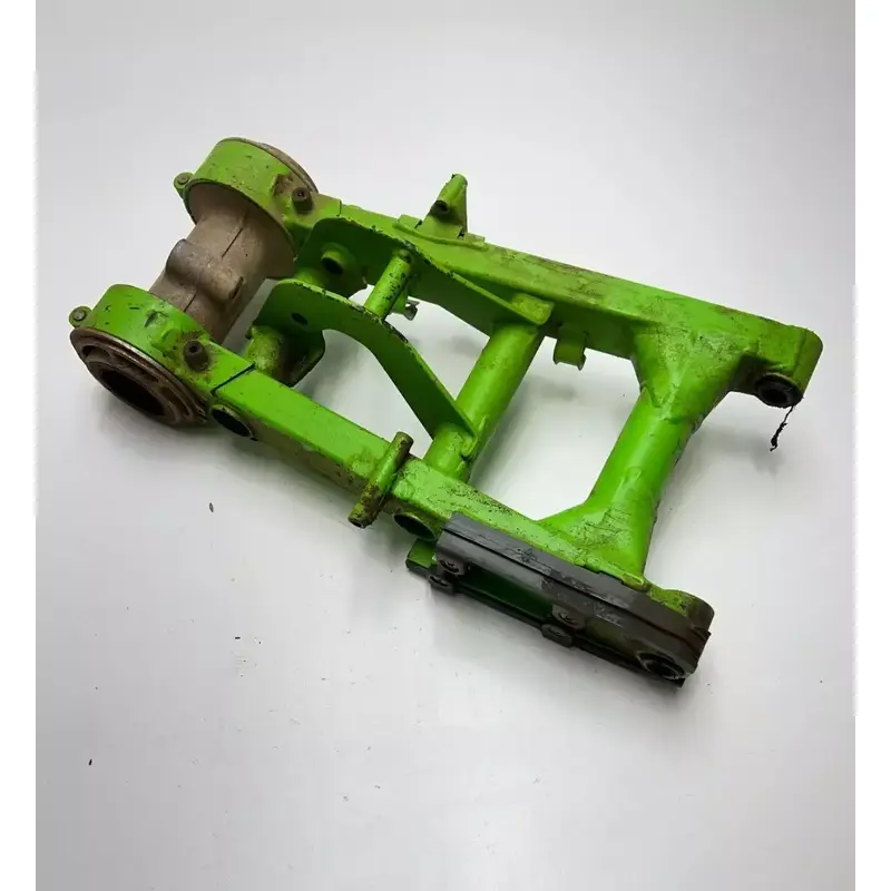 2000 Kawasaki Mojave 250 KSF250 OEM Swing Arm Axle Carrier Brake Mount Free Ship